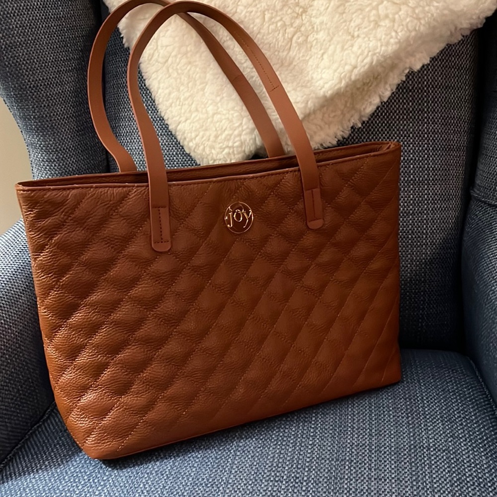 Leather bag, chestnut brown color. Never used.